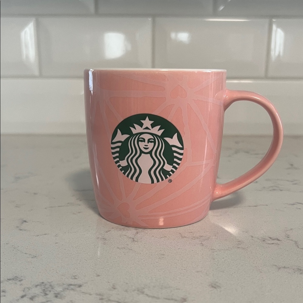 Starbucks pink coffee cup